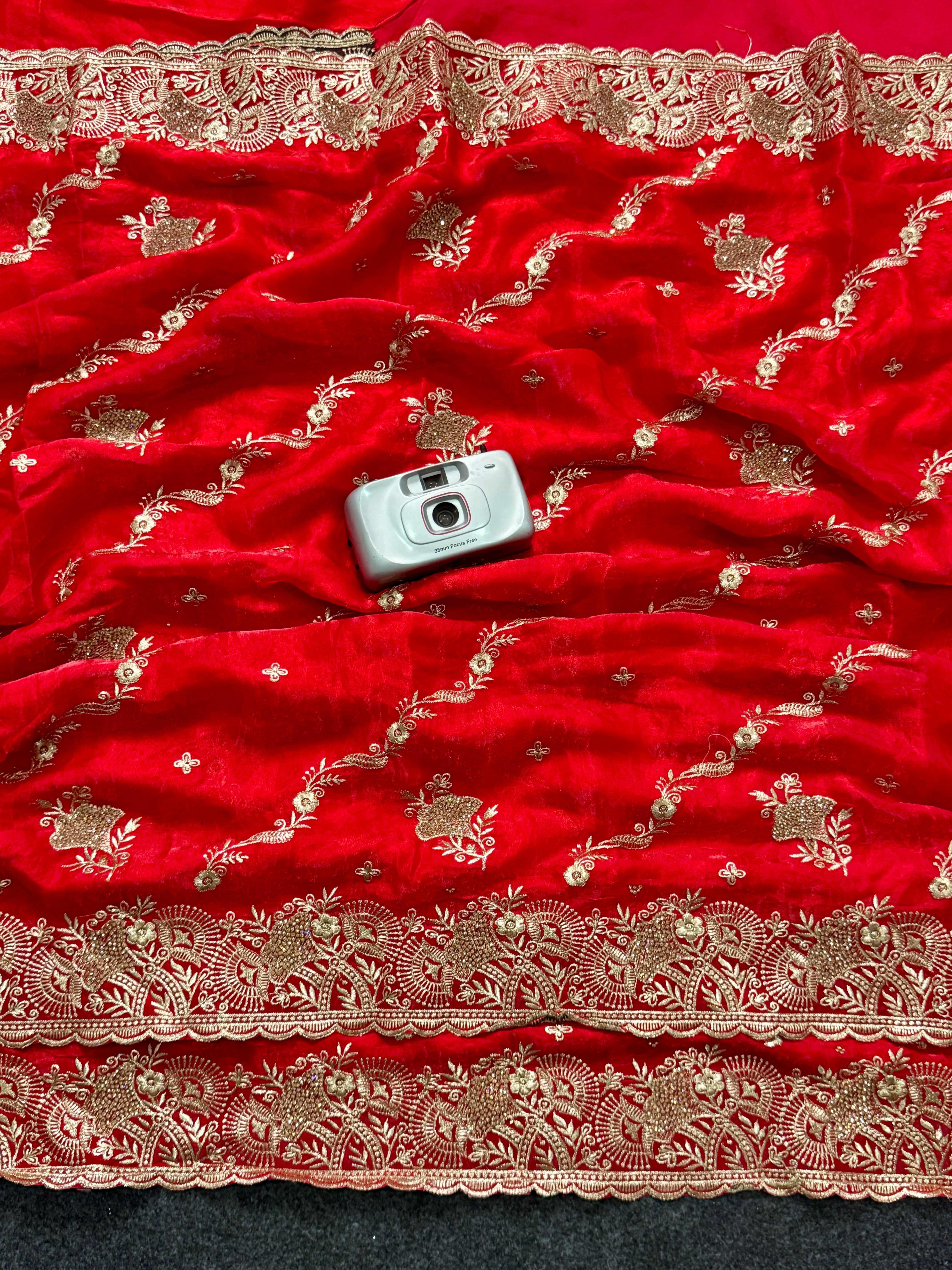 Elegant Mauve Red Embroidered Saree