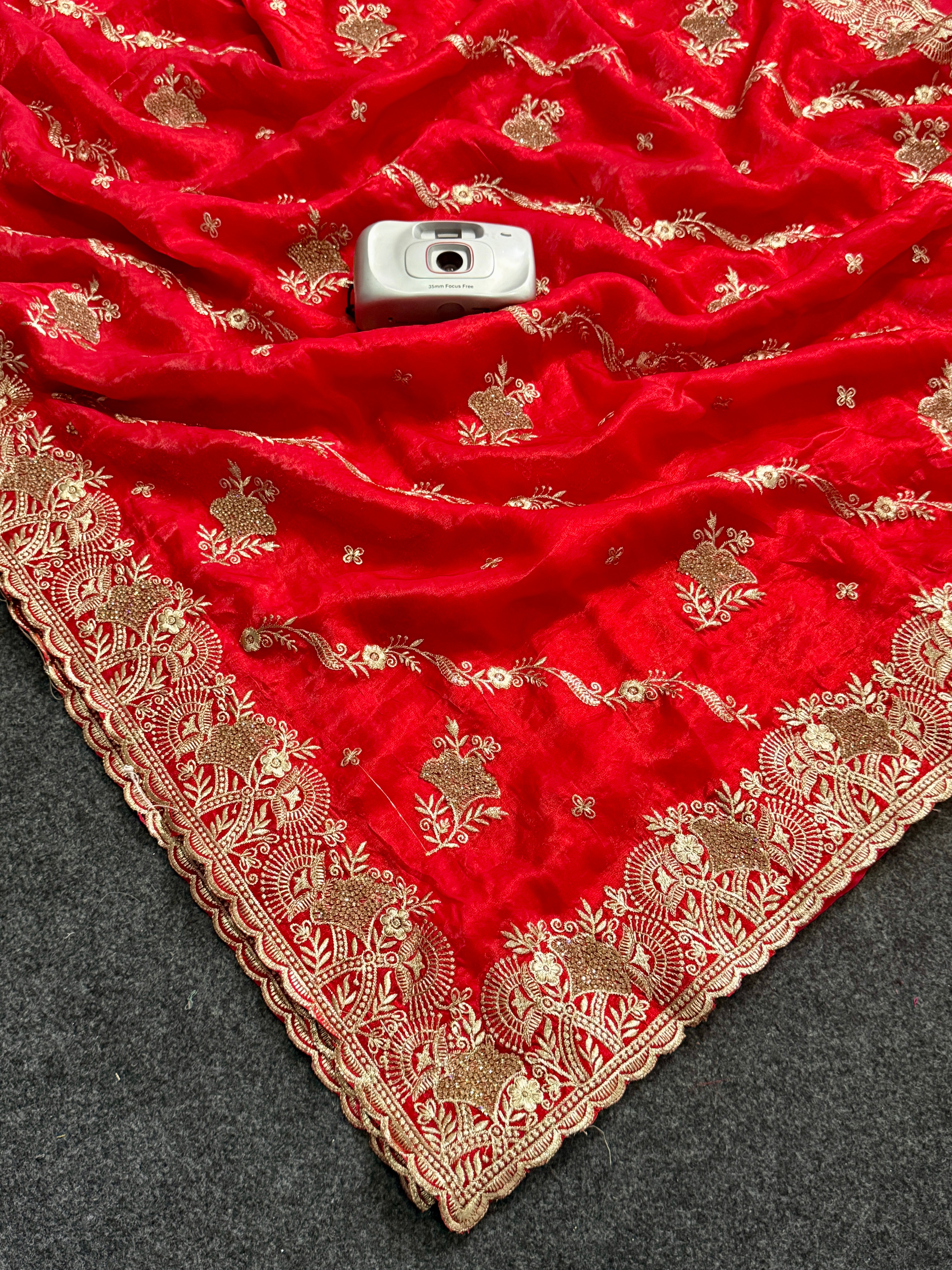 Elegant Mauve Red Embroidered Saree